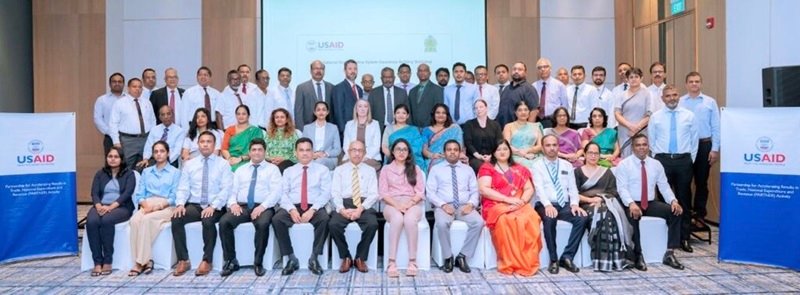 Public and Private stakeholders, including Mr. Mahinda Siriwardana, Secretary to the Ministry of Finance, Economic Stabilization and National Policies, pose for a group photo following the workshop